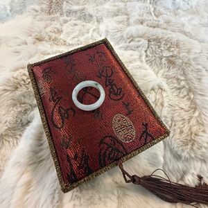 White Type A jade ring with 2 green pretty spots